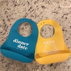 Brand New Bella Tunno Silicone Bib Set - Blue Dinner Date & Yellow Taco Tuesday